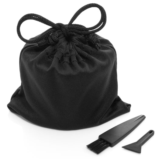 Stainless steel grinder in a black bag with a brush and a pollen scraper.
